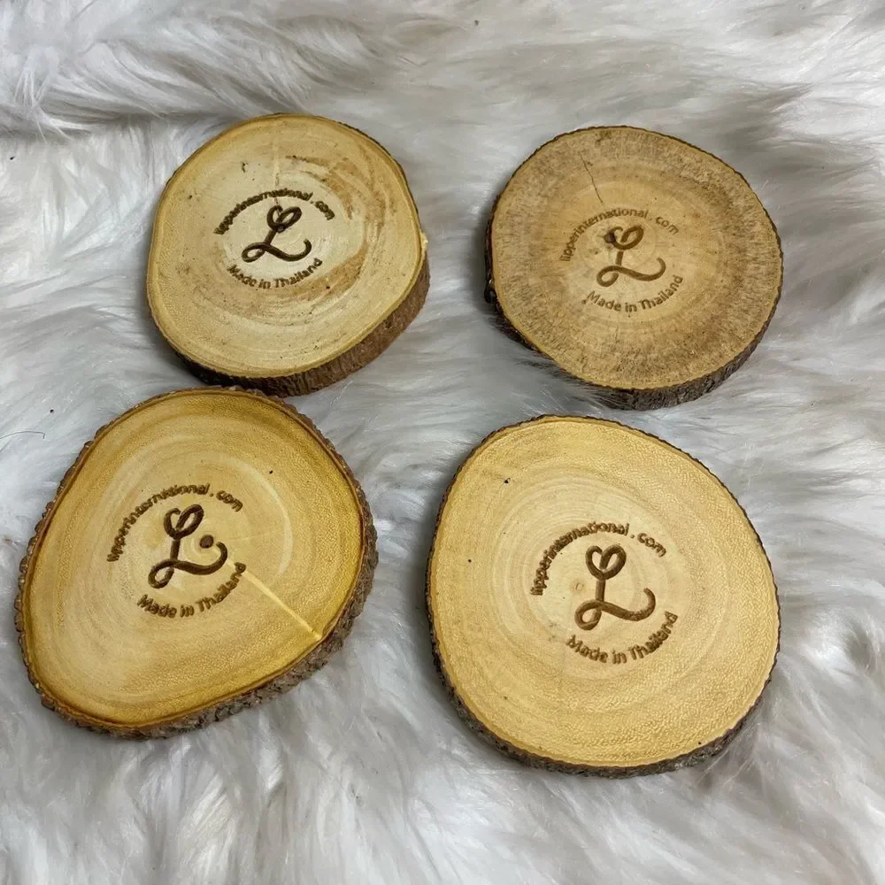 Lipper International Acacia Tree Barks set of four coasters .